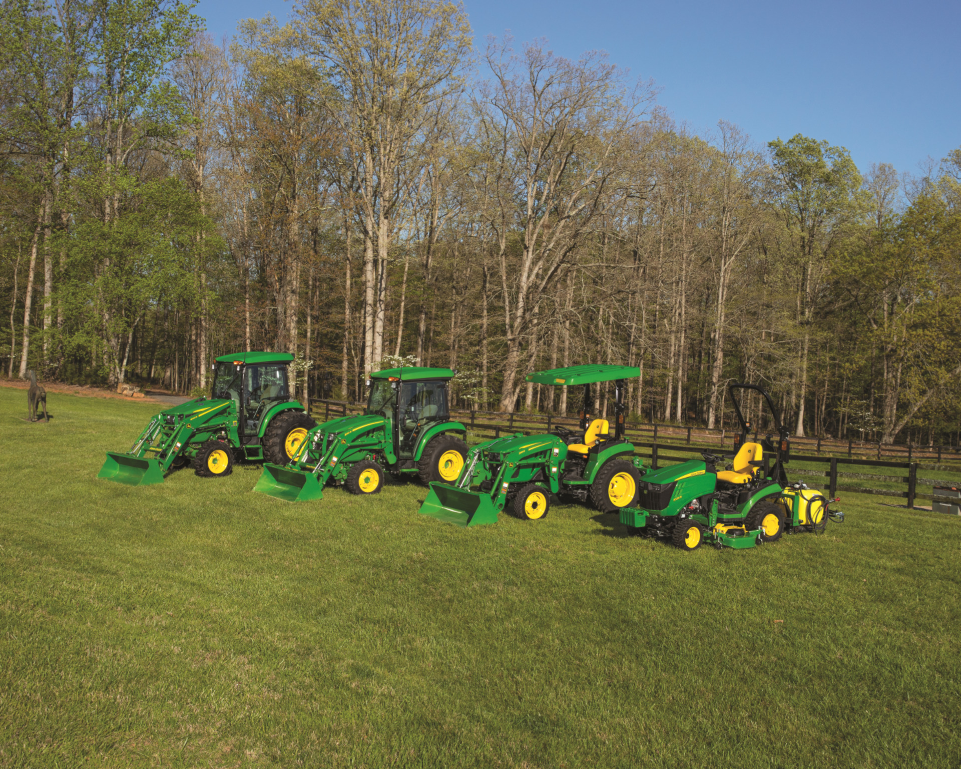 A lineup of used John Deere compact utility tractors in Texas.