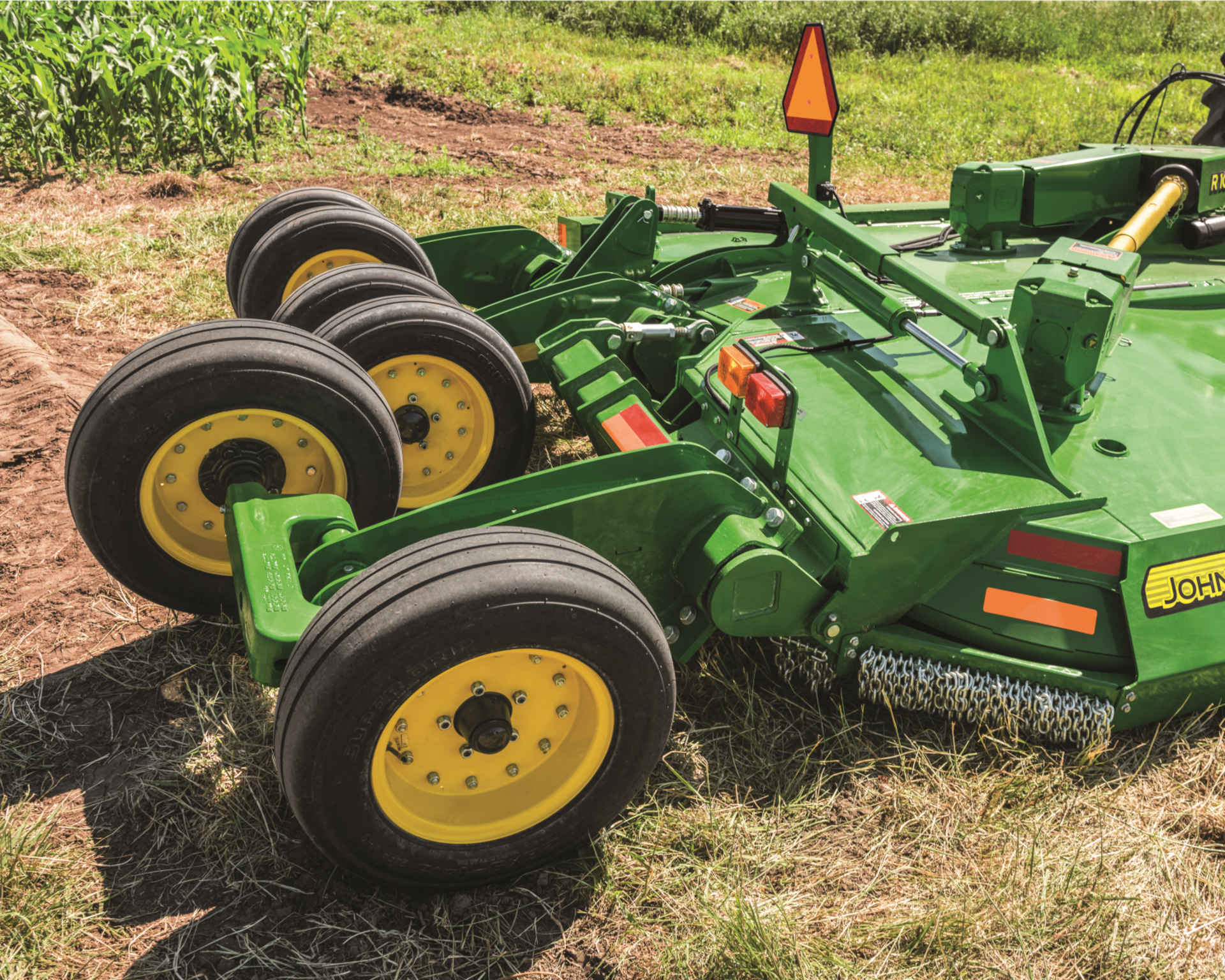 A John Deere rotary cutter attachment.