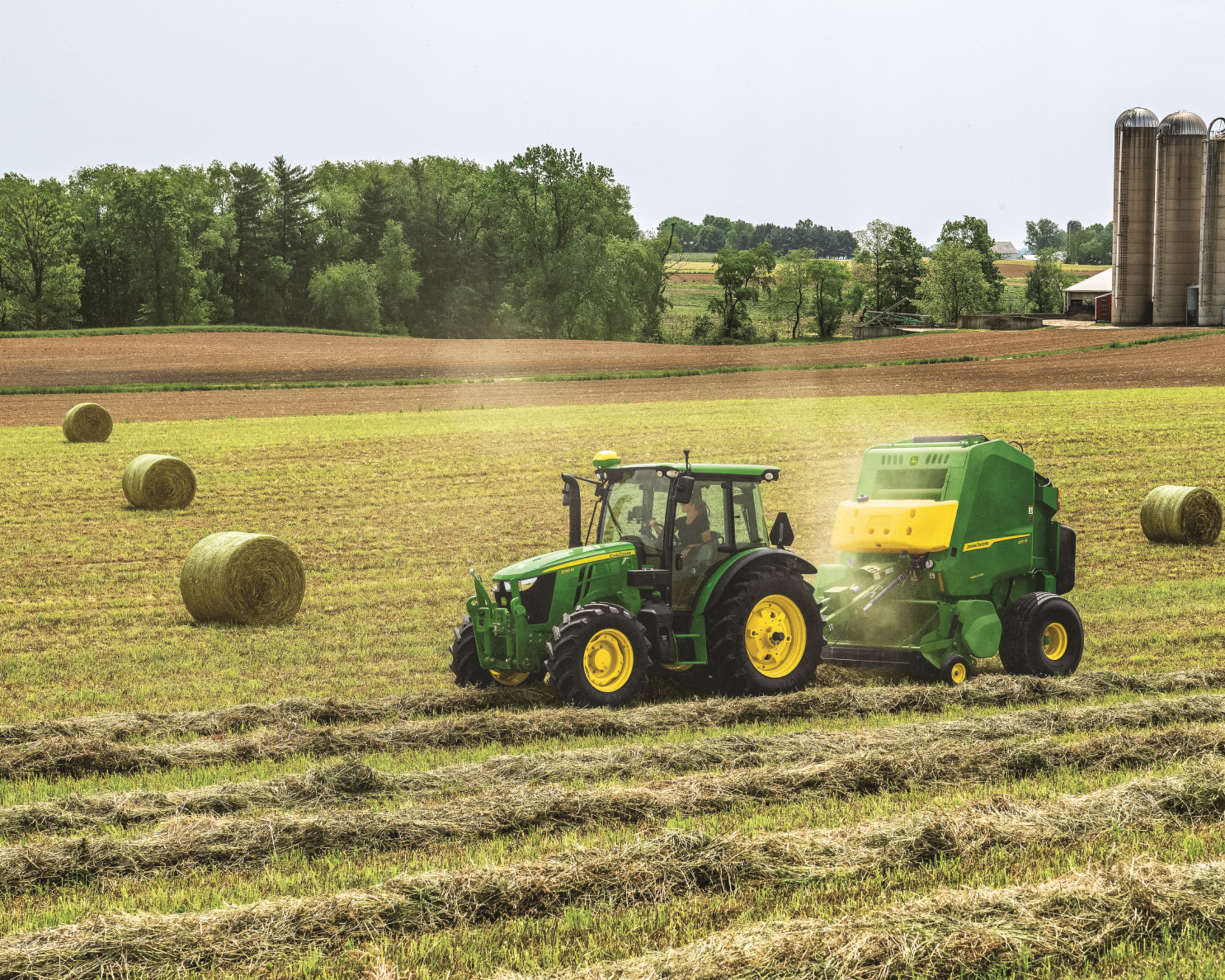 A John Deere round baler on a farm in Texas.